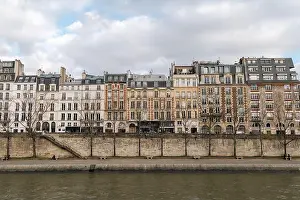 Cloud Sky Prints: Traditional Haussmann residential buildings along the River Seine in Paris