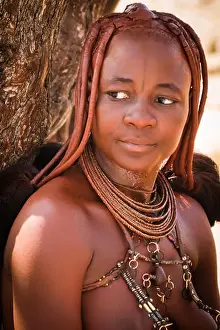 Traditional Himba women in typical dress in the Damaraland region of northern Namibia, in southern Africa