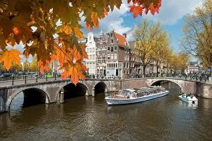 Images Dated 4th May 2016: Traditional old houses on canal at fall day in Amsterdam, Netherlands at autumn season