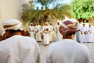 Oman Prints: Traditional Omani sword dance in Nizwa fort, Oman