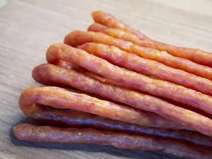 Wooden Surface Prints: Traditional Polish sausages Kabanos on a wooden surface