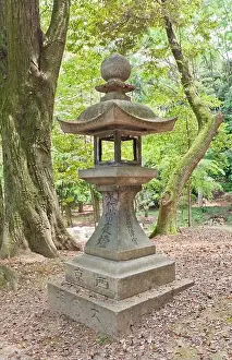 Kyoto Prints: Traditional stone lantern (toro) in Fushimi Inari Taisha Shinto Shrine in Kyoto