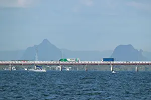 Bongaree Prints: Traffic going over Bribie Island Bridge seen from Bongaree, Queensland, QLD, Australia