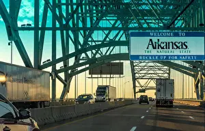 Mississippi River Prints: Traffic at sunset on the Hernando de Soto Bridge over the Mississippi River between Memphis