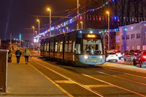 A tram heads towards Starr Gate along Blackpool Preomenade