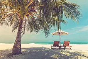 Tranquil beach scene. Exotic tropical beach resort, landscape for background or wallpaper. Design of summer vacation holiday concept