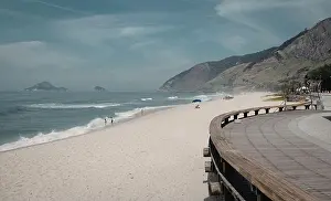 Water Blue Prints: A tranquil beach scene with a wooden walkway leading to the shore