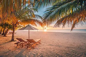 Sunset Landscape Prints: Tranquil beautiful beach. Chairs on the sandy beach near the sea