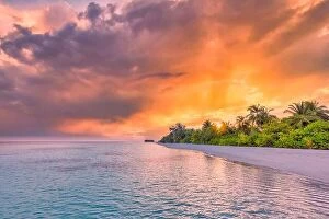 Images Dated 13th August 2022: Tranquil summer vacation or holiday landscape. Tropical island sunset beach