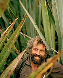 Workwear Prints: Trapper Bruce Reay amidst flax plants at Westland National Park