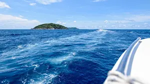 Trace Prints: Travel by speed boat to islands in the beautiful landscape of blue sea