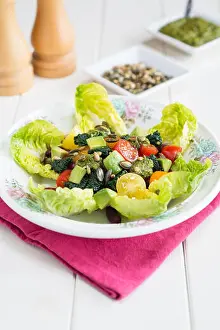 Avocado Prints: Tri-colour salad with beans, tomatoes, kale and avocado on a bed of little gem lettuce