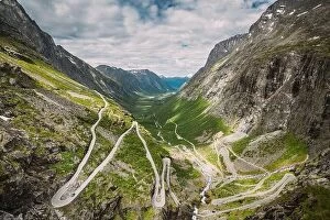 Images Dated 19th June 2019: Trollstigen, Andalsnes, Norway. Cars Goes On Serpentine Mountain Road Trollstigen