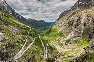 Images Dated 19th June 2019: Trollstigen, Andalsnes, Norway. Cars Goes On Serpentine Mountain Road Trollstigen