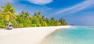 Tropical beach background as summer landscape with beach swing or hammock and white sand and calm sea for beach banner. Perfect beach scene vacation