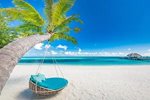 Tropical beach background as summer landscape with beach swing hammock white sand and calm sea for beach banner. Perfect beach scene vacation holiday