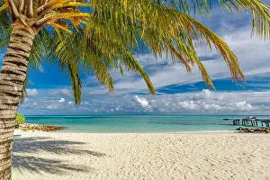 Tropical beach background as summer landscape with beach swing or hammock and white sand and calm sea for beach banner. Perfect beach scene vacation