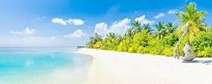 Tropical beach panorama as summer landscape with beach swing or hammock and white sand and calm sea for beach banner. Perfect beach scene vacation