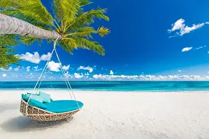 Tropical beach paradise as summer landscape with beach swing or hammock and white sand, calm sea for serene beach. Luxury beach scene vacation summer