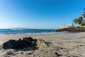 Tropical beaches with white sand and traditional boats are the entertainment for tourists in Bali