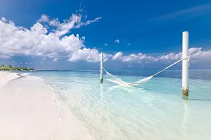 Tropical chill out, luxury beach with over water hammock endless sea view, exotic seascape. Summer vacation, holiday destination, relax and peaceful