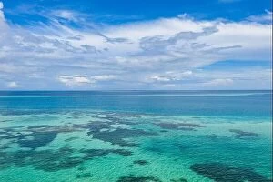 Images Dated 25th May 2019: Tropical island coast, aerial view of seascape with coral reef and infinity horizon sea view