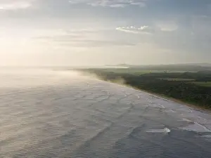 Nature Coast Prints: Tropical ocean beach coast on golden light aerial drone view