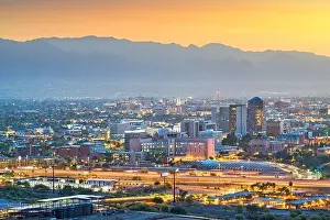 Tucson, Arizona, USA downtown city skyline with mountains at twilight