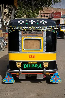 Mode Prints: A Tuk Tuk parked in a street, Bikaner, Rajasthan, India