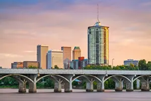 Tulsa, Oklahoma, USA downtown skyline on the Arkansas River at dusk