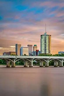 Tulsa, Oklahoma, USA downtown skyline on the Arkansas River at dusk