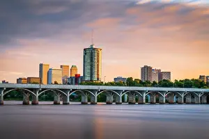 Tulsa, Oklahoma, USA downtown skyline on the Arkansas River at dusk