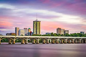 Tulsa, Oklahoma, USA downtown skyline on the Arkansas River at dusk