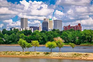 Tulsa, Oklahoma, USA downtown skyline on the Arkansas River at dusk