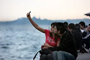 Taking Prints: TUR Turkey Istanbul Young couple at the Bosporus Besiktas