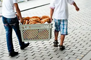 Ramadan Prints: Turkish Boys carrying loaves of bread, Holy Month Of Ramadan, Istanbul, Turkey