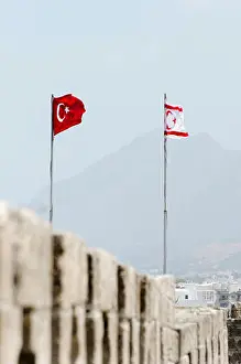 Turkish flags flying at Kyrenia Castle on the coast of Northern Cyprus