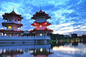 Peaceful Atmosphere Prints: The Twin Pagodas by the lake at the Chinese Garden in Singapore