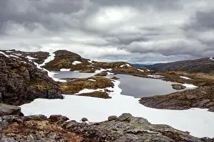 Landscape Prints: Typical norwegian landscape with snowy mountains and clear lake near the famous Aurlandsvegen (Bjorgavegen)