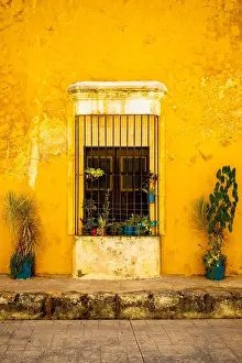 Mexican Prints: Typical old yellow house at the magical town of Izamal in Yucatan