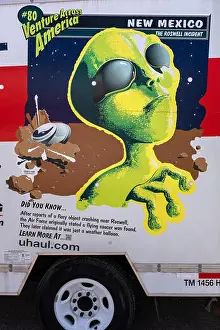 Aliens Prints: detail of U-Haul truck advertising travel to various U