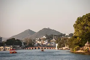 Holiday Destination Prints: Udaipur, Rajasthan, India. View over the water to the Daiji bridge, Lake Pichola