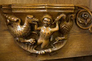 Advent Prints: UK Derbyshire Tideswell Church of St John the Baptist carved figure fighting gryphon misericord