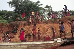 Boys Prints: A Ukre Village Brazil Kayapo men women and children at the riverside some with cooking pots