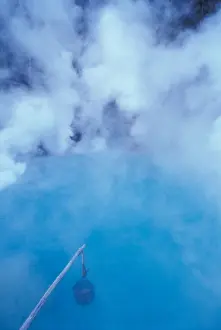Water Blue Prints: Umijigoku sea hell eggs basket put into hot water Beppu spa resort Kyushu island Japan