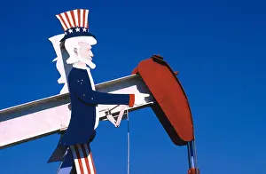 Red White And Blue Prints: 'Uncle Sam' art on pump jack, used to lift crude oil from the well