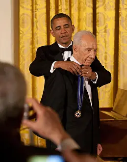 Politicians Prints: United States President Barack Obama awards the Presidential Medal of Freedom to President Shimon Peres of Israel