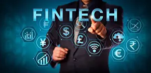Trader Prints: Unrecognizable business services manager touching FINTECH on an interactive screen