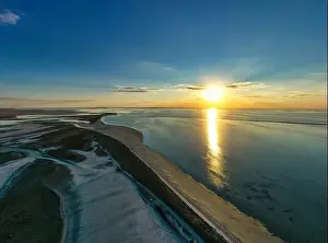 Unusual islands on a brilliant lake, top view, drone camera