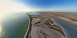 Unusual islands on a brilliant lake, top view, drone camera